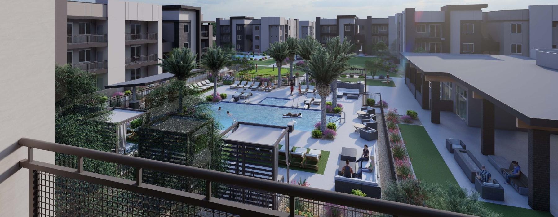 a balcony view of a building with a pool and trees
