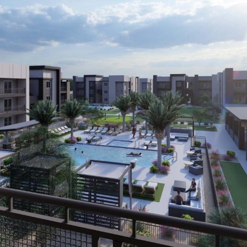 a balcony view of a building with a pool and trees
